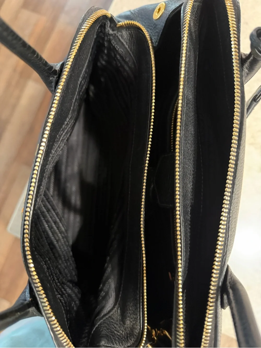 Prada Black Pebbled Leather Satchel with Gold Logo